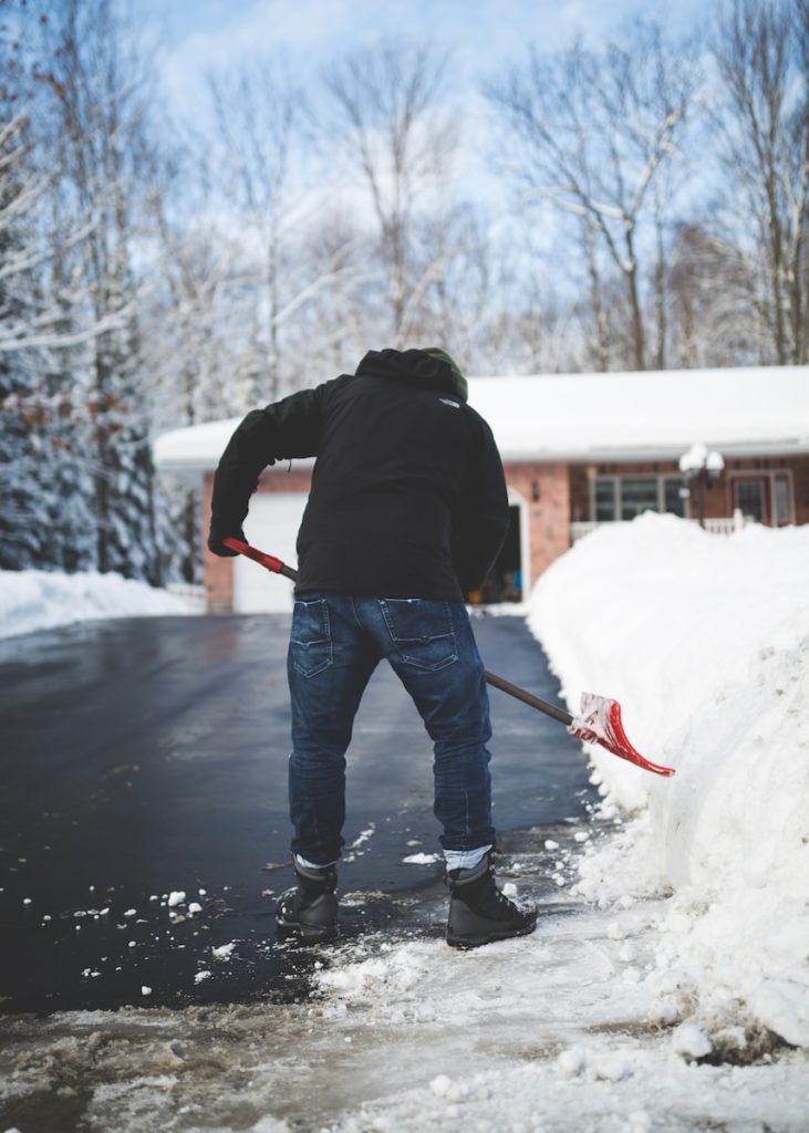 person shoveling snow